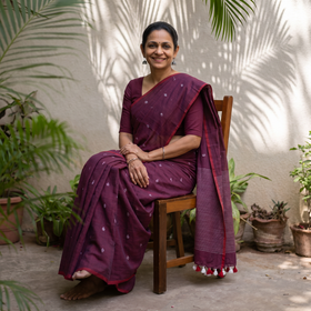 Purple Bengal Pure Mul Cotton Jamdani Saree with Tassels, draped and worn by a woman, AI visual of the saree, iTokri