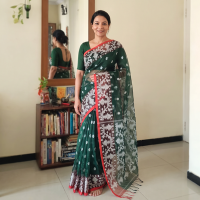 Green Bengal Pure Muslin Handloom Jamdani Saree, draped and worn by a woman, AI visual of the saree, iTokri