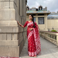 Red Bengal Pure Muslin Handloom Jamdani Saree, draped and worn by a woman, AI visual of the saree, iTokri