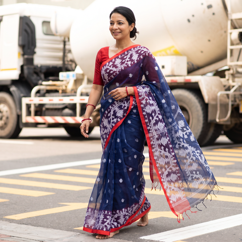 Blue Bengal Pure Muslin Handloom Jamdani Saree, draped and worn by a woman, AI visual of the saree, iTokri