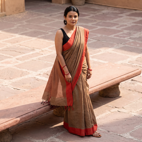Brown Bengal Woven Border Handloom Cotton Saree, draped and worn by a woman, AI visual of the saree, iTokri