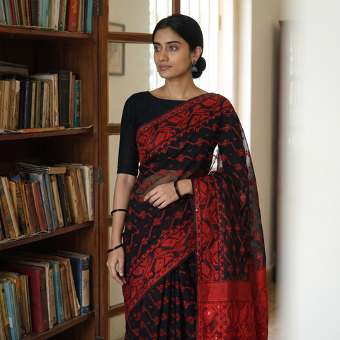 Black Bengal Woven Silk Cotton Saree, draped and worn by a woman, AI visual of the saree, iTokri
