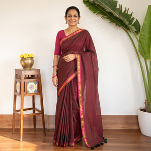 Maroon Bengal Zari Border Pure Mul Cotton Saree with Sequin Work, draped and worn by a woman, AI visual of the saree, iTokri
