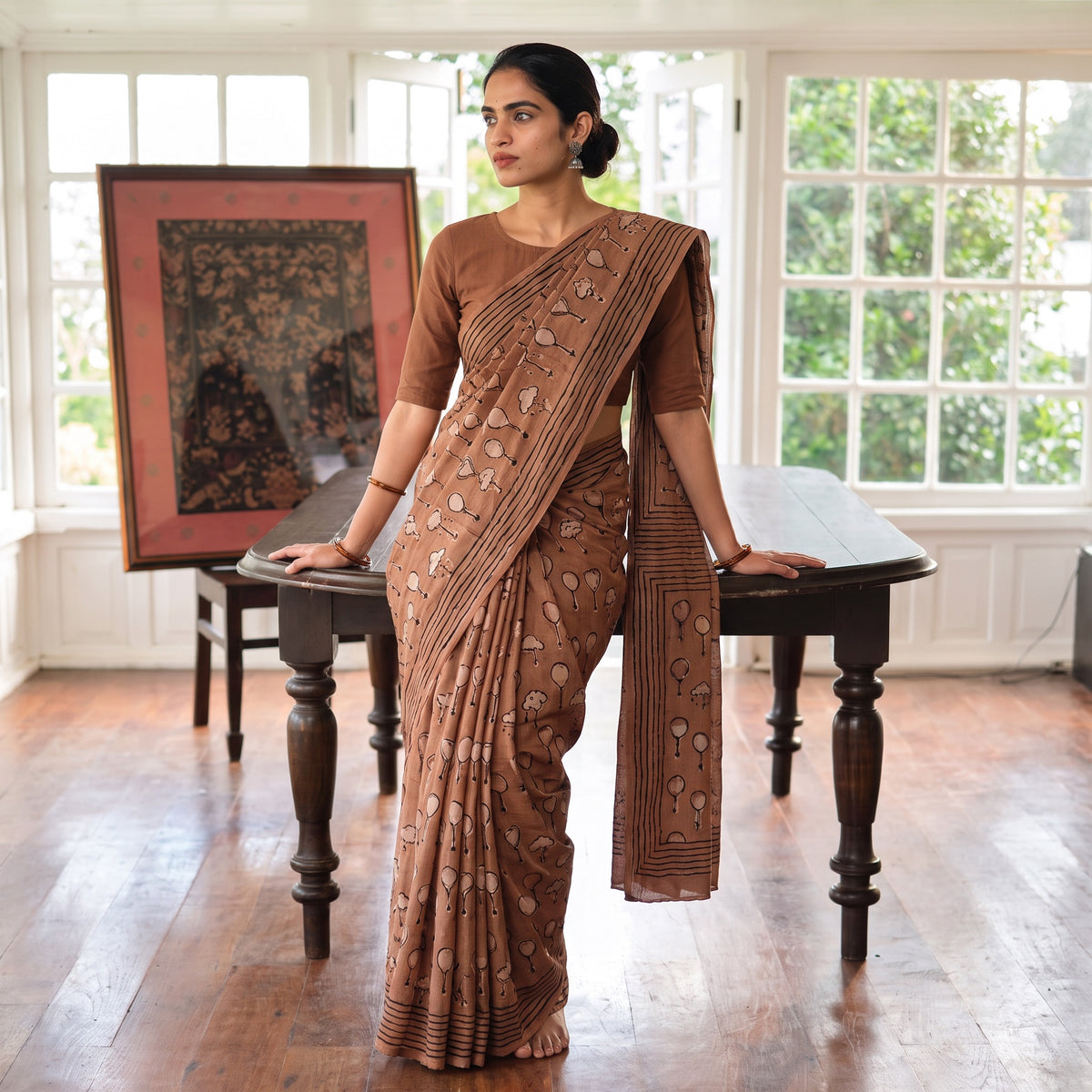 Brown Bindaas Art Natural Dyed Cotton Block Print Saree, draped and worn by a woman, AI visual of the saree, iTokri