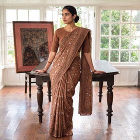 Brown Bindaas Art Natural Dyed Cotton Block Print Saree, draped and worn by a woman, AI visual of the saree, iTokri