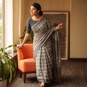 Grey Bindaas Art Natural Dyed Cotton Block Print Saree, draped and worn by a woman, AI visual of the saree, iTokri