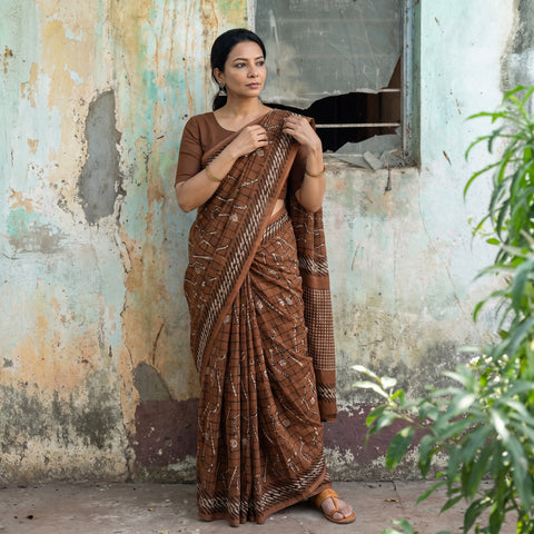 Brown Bindaas Art Natural Dyed Cotton Block Print Saree, draped and worn by a woman, AI visual of the saree, iTokri