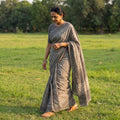 Grey Bindaas Art Natural Dyed Cotton Block Print Saree, draped and worn by a woman, AI visual of the saree, iTokri