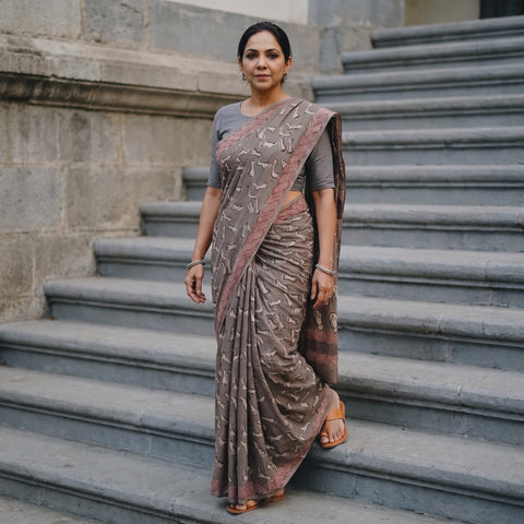 Brown Bindaas Art Natural Dyed Cotton Block Print Saree, draped and worn by a woman, AI visual of the saree, iTokri