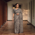 Grey Bindaas Art Natural Dyed Cotton Block Print Saree, draped and worn by a woman, AI visual of the saree, iTokri