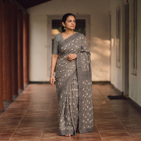 Grey Bindaas Art Natural Dyed Cotton Block Print Saree, draped and worn by a woman, AI visual of the saree, iTokri