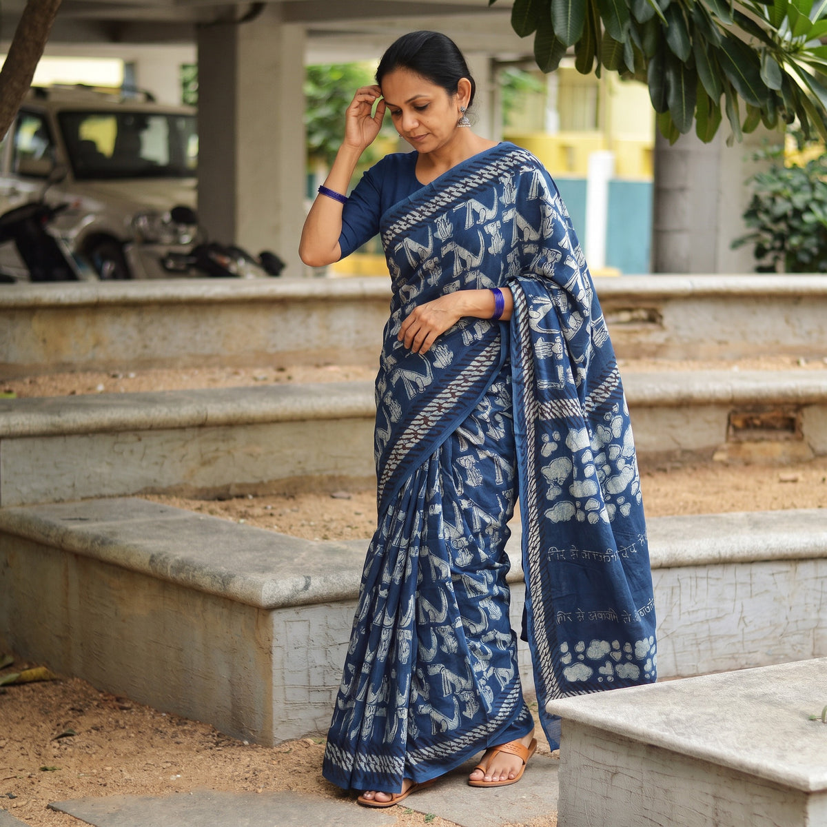 Blue Bindaas Art Natural Dyed Cotton Block Print Saree, draped and worn by a woman, AI visual of the saree, iTokri