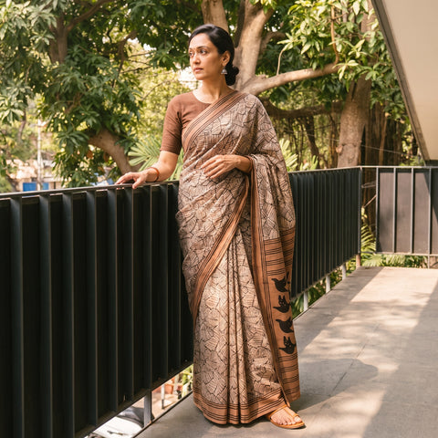 Brown Bindaas Art Natural Dyed Cotton Block Print Saree, draped and worn by a woman, AI visual of the saree, iTokri