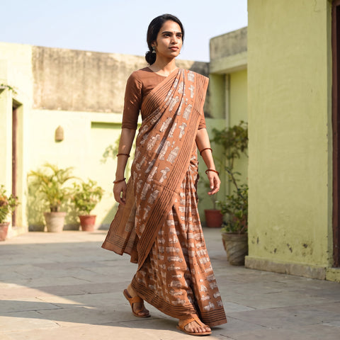 Brown Bindaas Art Natural Dyed Cotton Block Print Saree, draped and worn by a woman, AI visual of the saree, iTokri
