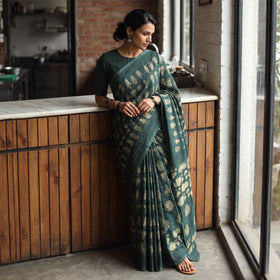 Green Bindaas Art Natural Dyed Cotton Block Print Saree, draped and worn by a woman, AI visual of the saree, iTokri