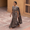 Grey Bindaas Art Natural Dyed Cotton Block Print Saree, draped and worn by a woman, AI visual of the saree, iTokri