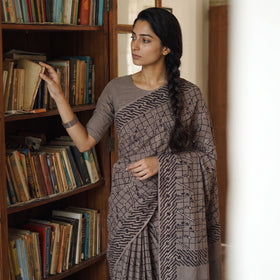 Brown Bindaas Art Natural Dyed Cotton Block Print Saree, draped and worn by a woman, AI visual of the saree, iTokri