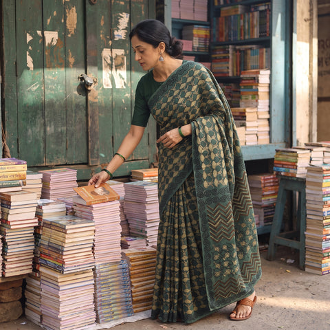 Green Bindaas Art Natural Dyed Cotton Block Print Saree, draped and worn by a woman, AI visual of the saree, iTokri