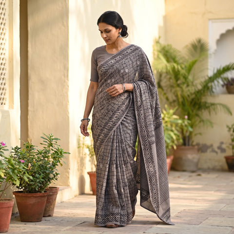 Brown Bindaas Art Natural Dyed Cotton Block Print Saree, draped and worn by a woman, AI visual of the saree, iTokri