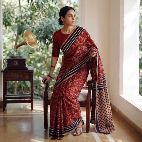 Maroon Bindaas Art Natural Dyed Cotton Block Print Saree, draped and worn by a woman, AI visual of the saree, iTokri