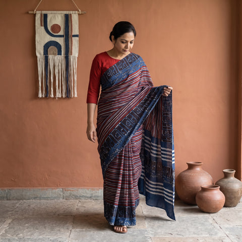 Blue Bindaas Art Natural Dyed Cotton Block Print Saree, draped and worn by a woman, AI visual of the saree, iTokri