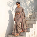 Brown Bindaas Art Natural Dyed Cotton Block Print Saree, draped and worn by a woman, AI visual of the saree, iTokri