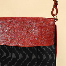 Black - Handcrafted Ikat Fabric Sling Bag with Embossed Leather Flap