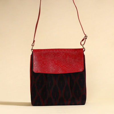 Black Handcrafted Ikat Fabric Sling Bag with Embossed Leather Flap