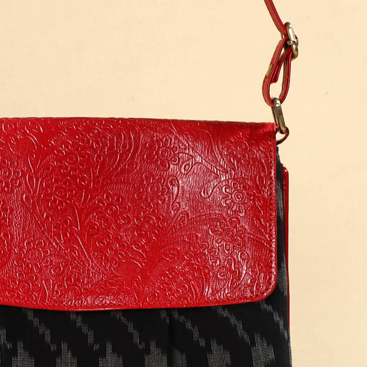 Blak Handcrafted Ikat Fabric Sling Bag with Embossed Leather Flap