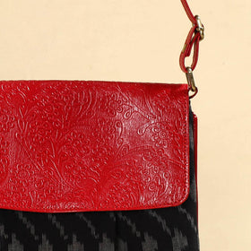 Blak Handcrafted Ikat Fabric Sling Bag with Embossed Leather Flap