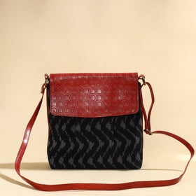 Black - Handcrafted Ikat Fabric Sling Bag with Embossed Leather Flap