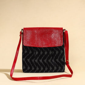 Blak Handcrafted Ikat Fabric Sling Bag with Embossed Leather Flap