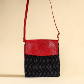 Blak Handcrafted Ikat Fabric Sling Bag with Embossed Leather Flap