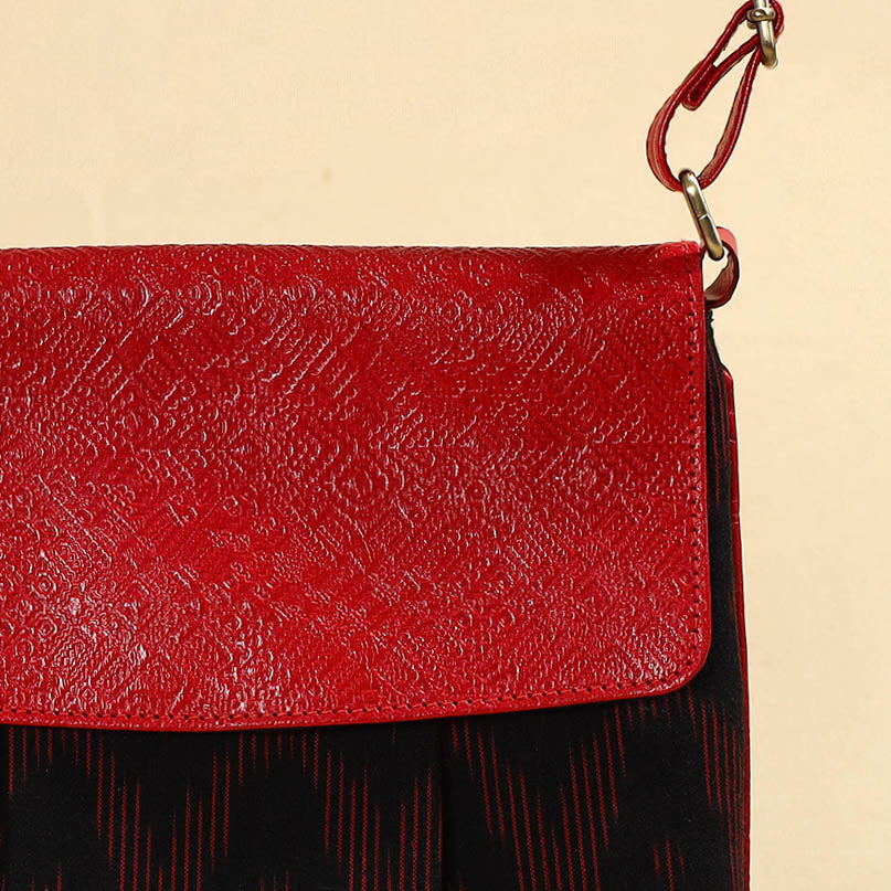 Black Handcrafted Ikat Fabric Sling Bag with Embossed Leather Flap