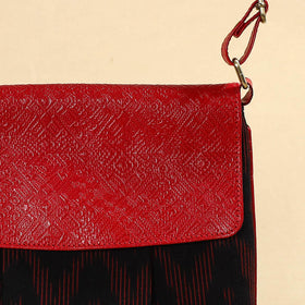 Black Handcrafted Ikat Fabric Sling Bag with Embossed Leather Flap