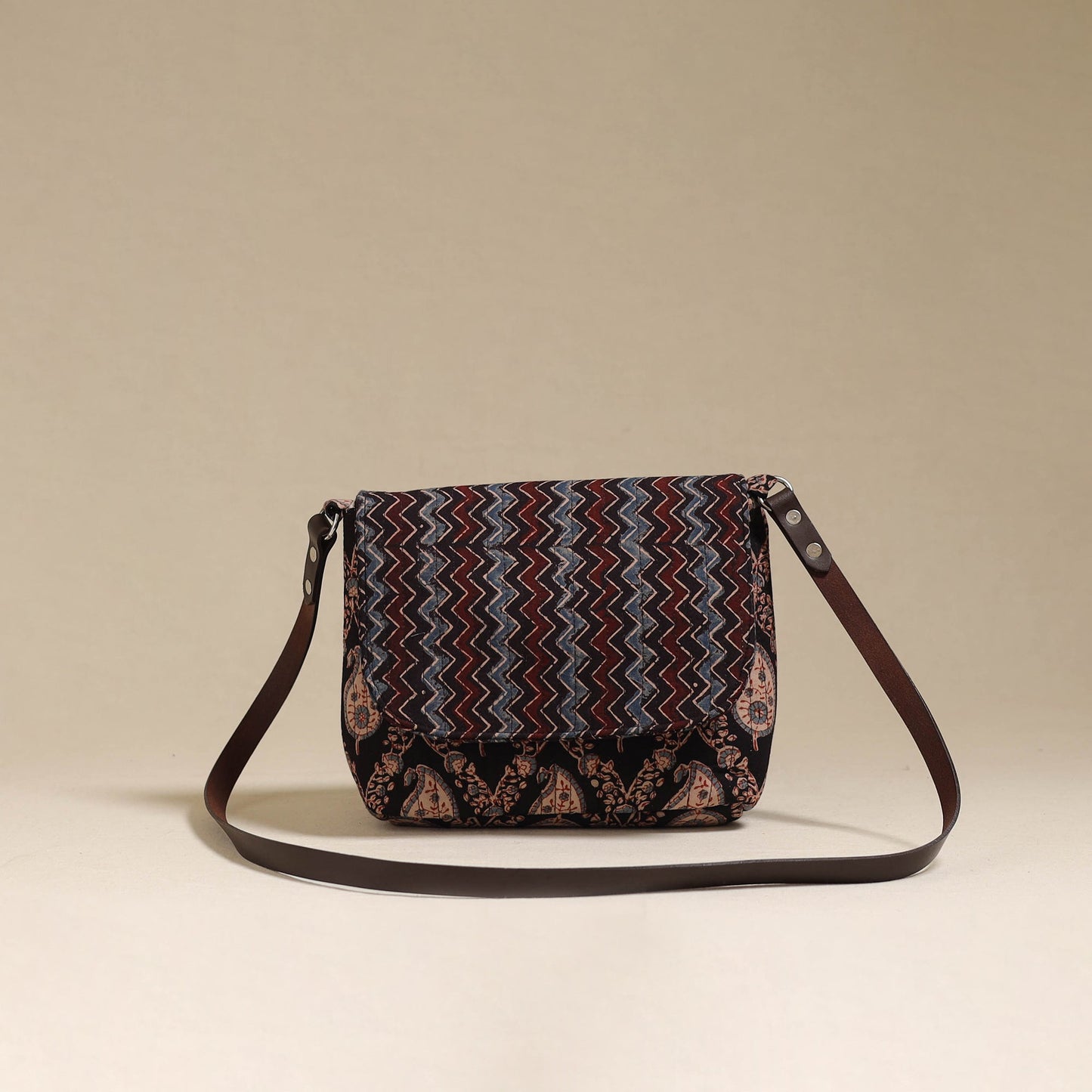 Handcrafted quilted ajrakh block printed fabric sling bag