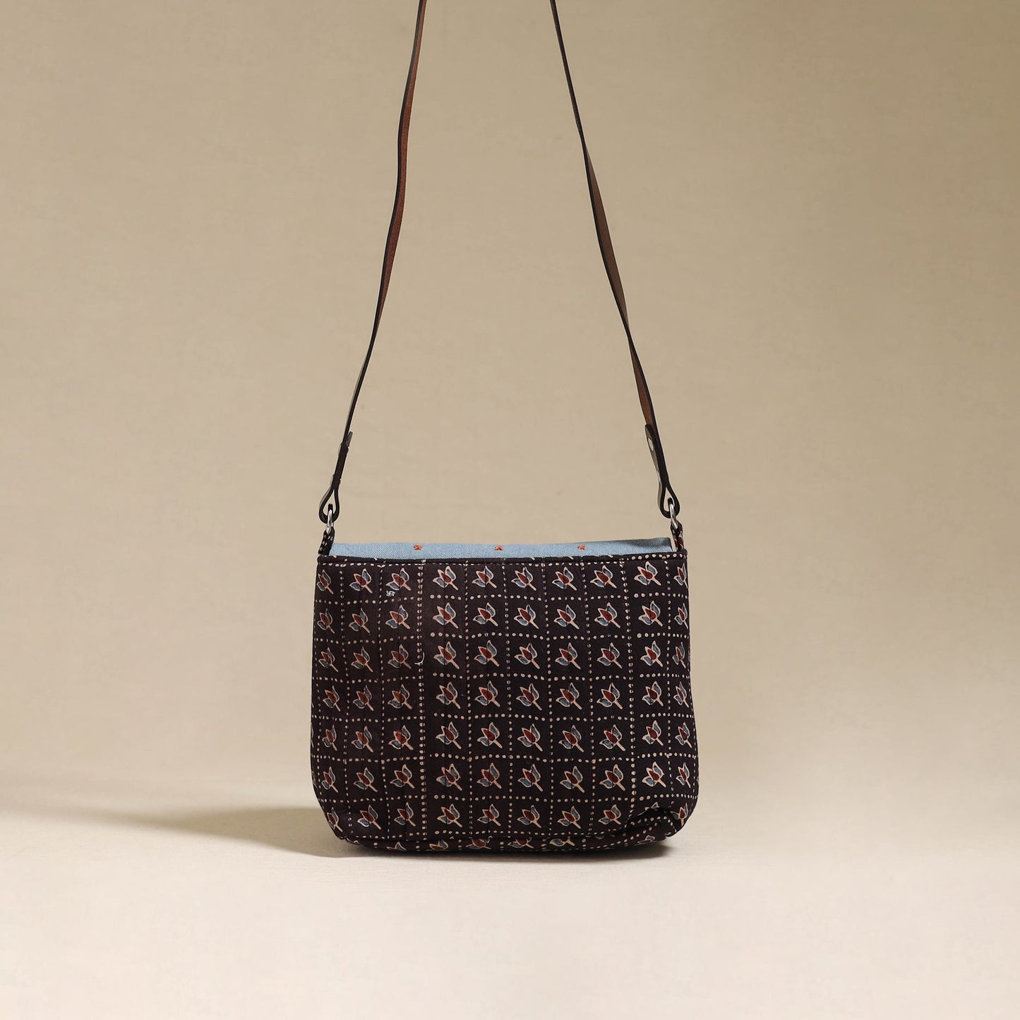 Handcrafted quilted ajrakh block printed fabric sling bag