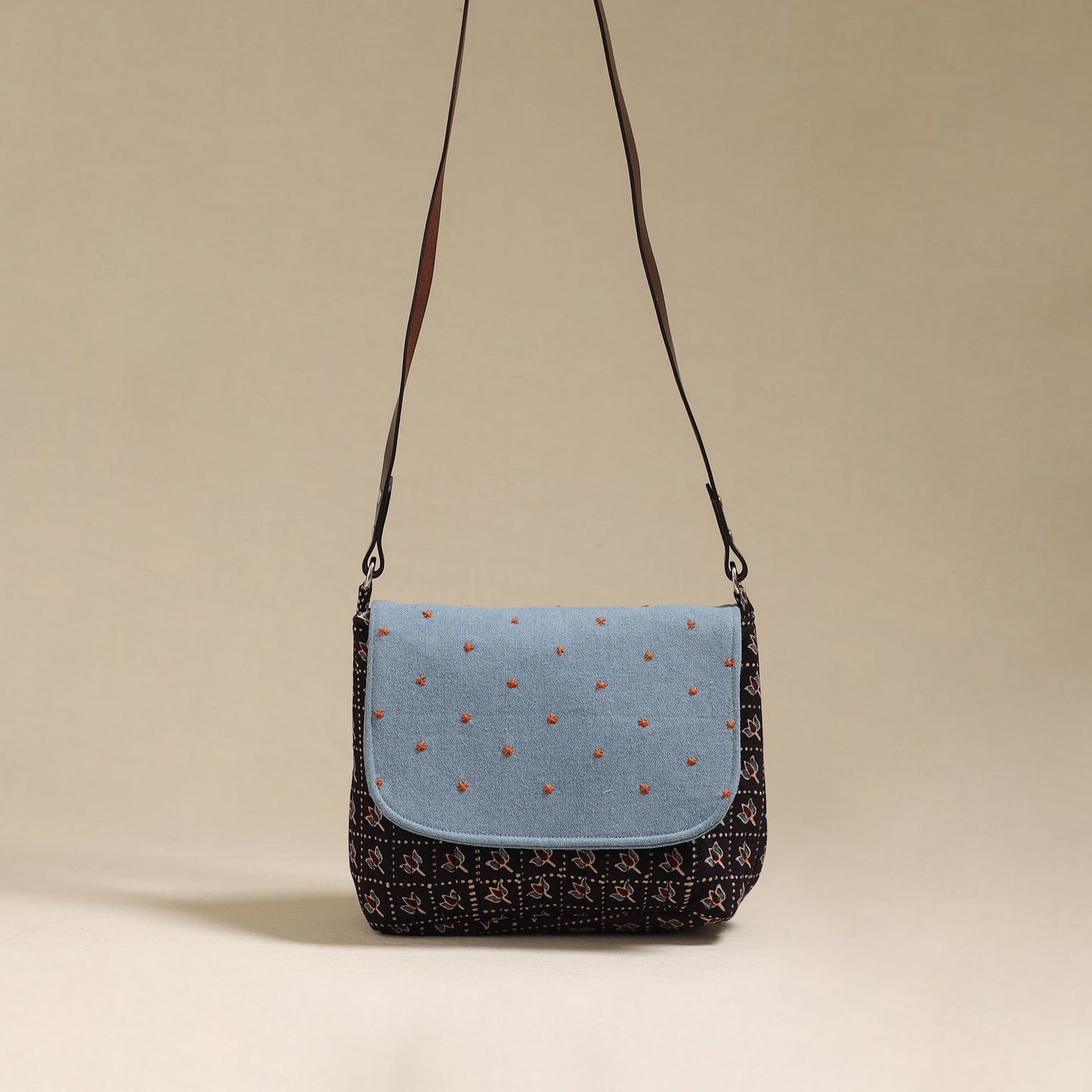 Handcrafted quilted ajrakh block printed fabric sling bag