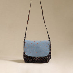 Handcrafted quilted ajrakh block printed fabric sling bag