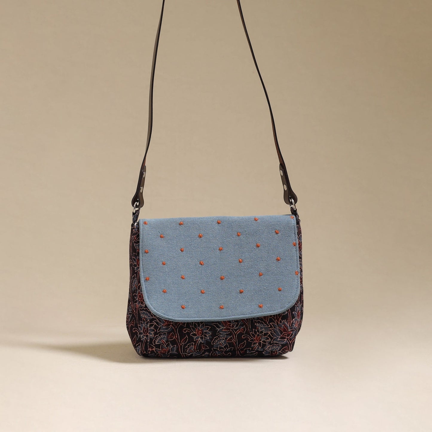 Handcrafted quilted ajrakh block printed fabric sling bag