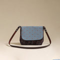 Handcrafted quilted ajrakh block printed fabric sling bag