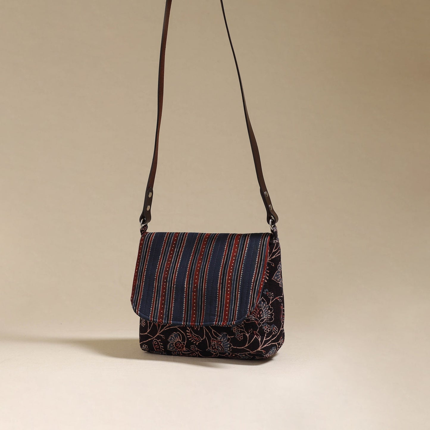 Handcrafted quilted ajrakh block printed fabric sling bag