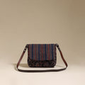 Handcrafted quilted ajrakh block printed fabric sling bag