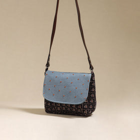 Handcrafted quilted ajrakh block printed fabric sling bag