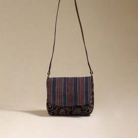 Handcrafted quilted ajrakh block printed fabric sling bag