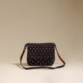 Handcrafted quilted ajrakh block printed fabric sling bag