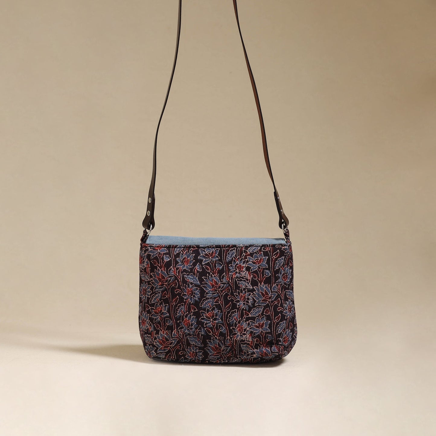 Handcrafted quilted ajrakh block printed fabric sling bag