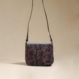 Handcrafted quilted ajrakh block printed fabric sling bag