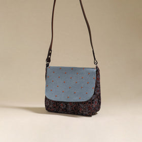 Handcrafted quilted ajrakh block printed fabric sling bag
