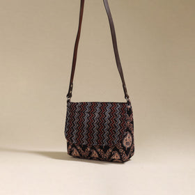 Handcrafted quilted ajrakh block printed fabric sling bag